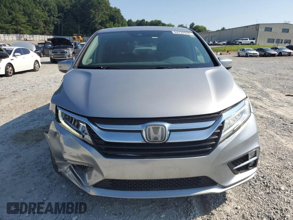 2018 Honda Odyssey Elite with VIN 5FNRL6H95JB062033, listed as a Copart auction lot 63732915 with 105,234 mi miles and Salvage title. Bid and sale history available at DreamBid. Image 5.