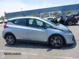 2017 Chevrolet Bolt EV Premier z VIN 1G1FX6S05H4141097, wystawiony jako IAAI lot #42164351 z przebiegiem 93 210 mil mil oraz . Historia ofert i sprzedaży dostępna na DreamBid. Obrazek 12.