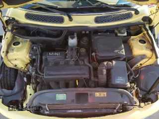 2002 MINI Hardtop with VIN WMWRC33422TC35953, listed as a Copart auction lot 42347465 with 126,890 mi miles and Salvage Title. Bid and sale history available at DreamBid. Image 11.