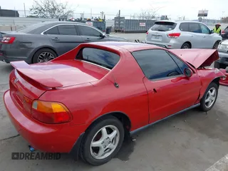 1995 Honda del Sol Si with VIN JHMEH6261SS001456, listed as a IAAI auction lot 42051132 with 230,061 mi miles. Bid and sale history available at carsss.com. Image 4.