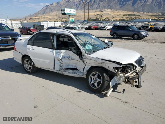 2002 Mitsubishi Lancer OZ-Rally with VIN JA3AJ86E72U081253, listed as a Copart auction lot 48244185 with 260,671 mi miles and Salvage Title. Bid and sale history available at carsss.com. Image 4.