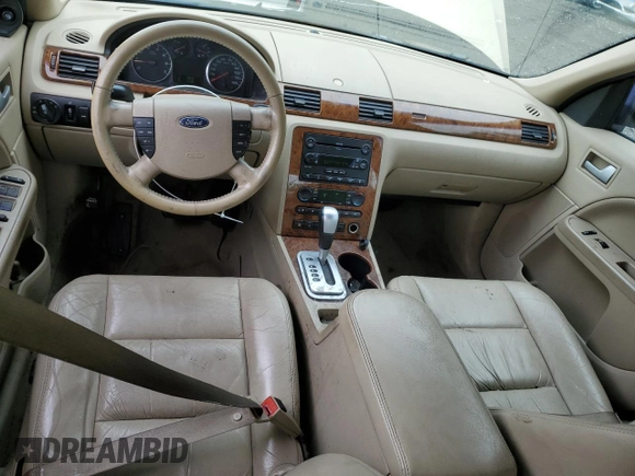 2007 Ford Five Hundred SEL with VIN 1FAHP24137G163701, listed as a Copart auction lot 60826555 with 169,948 mi miles and Salvage title. Bid and sale history available at DreamBid. Image 8.