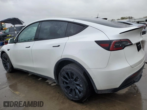 2022 Tesla Model Y Long Range with VIN 7SAYGDEE1NF491488, listed as a Copart auction lot 49266945 with 44,703 mi miles and Salvage Title. Bid and sale history available at carsss.com. Image 2.