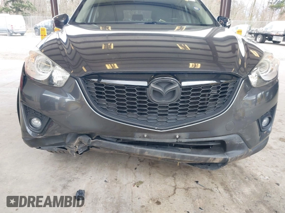 2015 Mazda CX-5 Grand Touring with VIN JM3KE2DY0F0508796, listed as a IAAI auction lot 41798482 with 110,260 mi miles. Bid and sale history available at carsss.com. Image 6.