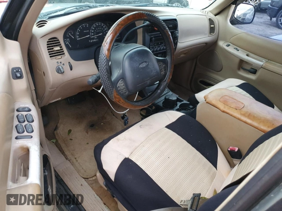 1999 Ford Explorer XL z VIN 1FMDU32E9XZB67958, wystawiony jako Copart lot #75350694 z przebiegiem 202 939 mil mil oraz Szkoda całkowita • Salvage title. Historia ofert i sprzedaży dostępna na DreamBid. Obrazek 8.