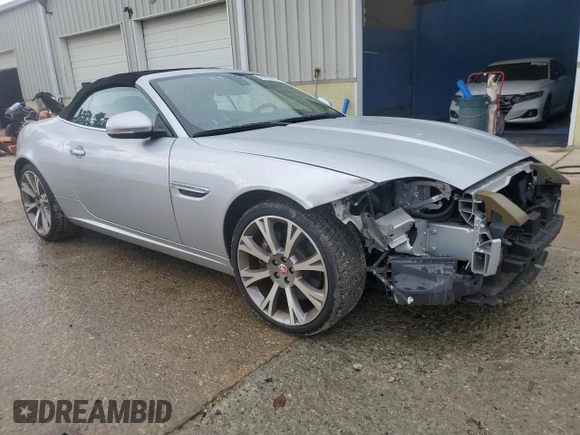 2014 Jaguar XK with VIN SAJWA4GB7ELB54429, listed as a Copart auction lot 72463344 with 72,711 mi miles and Salvage Title. Bid and sale history available at carsss.com. Image 4.