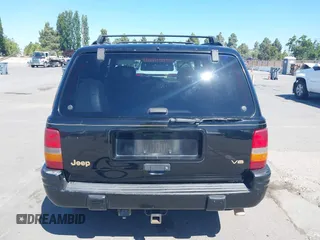1997 Jeep Grand Cherokee Limited z VIN 1J4GZ78Y3VC683674, wystawiony jako IAAI lot #42331984 z przebiegiem 227 226 mil mil oraz . Historia ofert i sprzedaży dostępna na DreamBid. Obrazek 16.