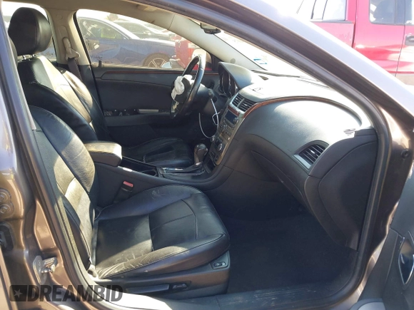 2012 Chevrolet Malibu LTZ with VIN 1G1ZG5E74CF133103, listed as a IAAI auction lot 41640075 with 173,692 mi miles and . Bid and sale history available at DreamBid. Image 5.