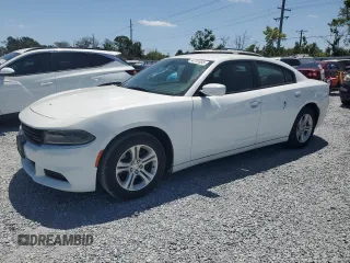 2019 Dodge Charger SXT with VIN 2C3CDXBG2KH664761, listed as a Copart auction lot 54741055 with 82,772 mi miles and Salvage Title. Bid and sale history available at DreamBid. Image 1.