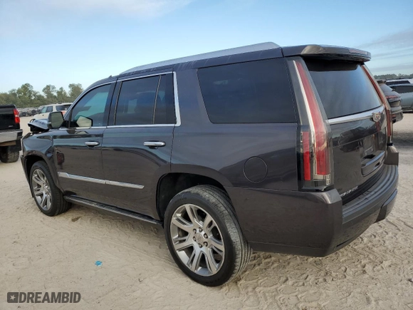2015 Cadillac Escalade Premium with VIN 1GYS3NKJ2FR722538, listed as a Copart auction lot 77674394 with 130,718 mi miles and Salvage Title. Bid and sale history available at carsss.com. Image 2.