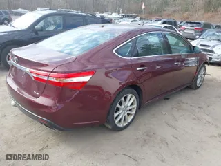 2013 Toyota Avalon XLE with VIN 4T1BK1EBXDU070666, listed as a IAAI auction lot 41766905 with 115,904 mi miles. Bid and sale history available at carsss.com. Image 4.
