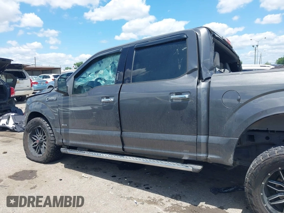 2015 Ford F-150 XL with VIN 1FTEW1CP3FKE14583, listed as a IAAI auction lot 42237940 with 131,667 mi miles and . Bid and sale history available at DreamBid. Image 14.