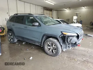 2014 Jeep Cherokee Trailhawk z VIN 1C4PJMBB0EW309277, wystawiony jako Copart lot #52370565 z przebiegiem 148 924 mil mil oraz Czysty tytuł • Clean title. Historia ofert i sprzedaży dostępna na DreamBid. Obrazek 4.