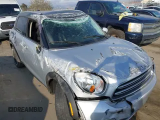 2015 MINI Countryman with VIN WMWZB3C56FWR43359, listed as a IAAI auction lot 40720320 with 69,898 mi miles and . Bid and sale history available at DreamBid. Image 6.