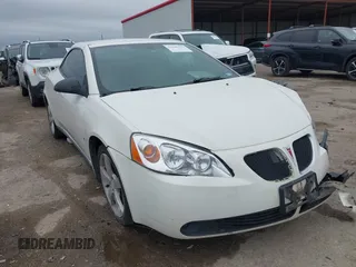 2007 Pontiac G6 GT with VIN 1G2ZH351674151077, listed as a IAAI auction lot 41946215 with 187,449 mi miles. Bid and sale history available at carsss.com. Image 1.