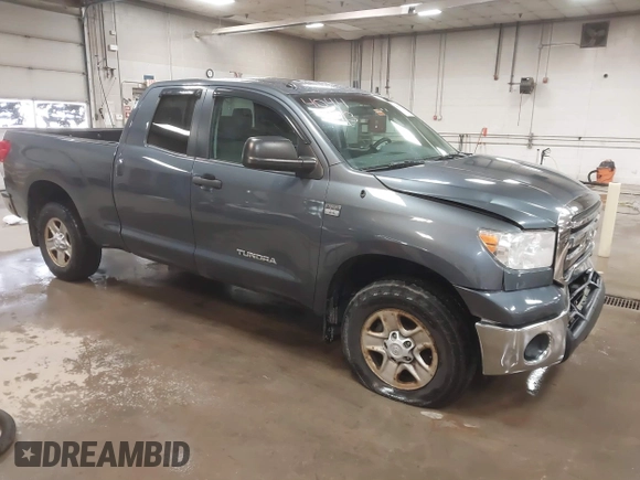 2010 Toyota Tundra 4WD Truck with VIN 5TFUM5F16AX006879, listed as a IAAI auction lot 40447273 with 219,498 mi miles. Bid and sale history available at carsss.com. Image 1.