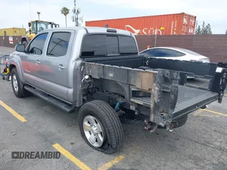 2014 Toyota Tacoma PreRunner z VIN 3TMJU4GNXEM164121, wystawiony jako IAAI lot #42568581 z przebiegiem 201 316 mil mil oraz . Historia ofert i sprzedaży dostępna na DreamBid. Obrazek 3.