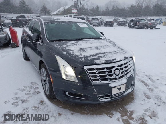 2013 Cadillac XTS with VIN 2G61N5S37D9112979, listed as a IAAI auction lot 41209826 with 83,237 mi miles. Bid and sale history available at carsss.com. Image 1.