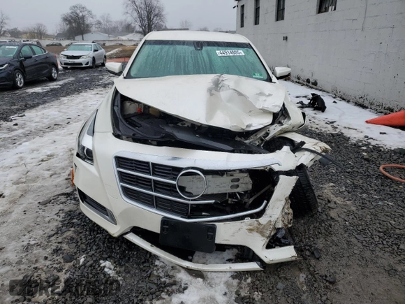 2014 Cadillac CTS AWD z VIN 1G6AW5SX0E0124225, wystawiony jako Copart lot #44914805 z przebiegiem Nie podano mil oraz Szkoda całkowita • Salvage title. Historia ofert i sprzedaży dostępna na DreamBid. Obrazek 5.