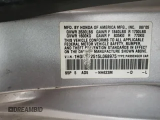 2005 Honda Civic LX with VIN 1HGEM22515L068975, listed as a Copart auction lot 52055435 with 206,058 mi miles and Salvage Title. Bid and sale history available at DreamBid. Image 12.