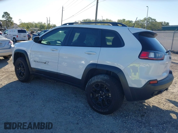 2022 Jeep Cherokee X with VIN 1C4PJMCX2ND533284, listed as a IAAI auction lot 41827335 with 19,404 mi miles. Bid and sale history available at carsss.com. Image 3.