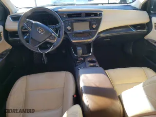 2016 Toyota Avalon Hybrid XLE Premium with VIN 4T1BD1EB7GU056738, listed as a Copart auction lot 77008243 with 130,760 mi miles. Bid and sale history available at carsss.com. Image 8.