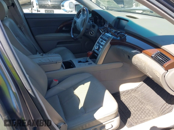 2007 Acura RL Tech Pkg with VIN JH4KB16647C002703, listed as a IAAI auction lot 41882614 with 174,713 mi miles. Bid and sale history available at carsss.com. Image 5.