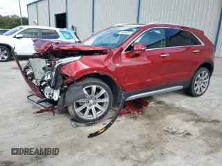 2021 Cadillac XT4 FWD Premium Luxury with VIN 1GYFZCR41MF043072, listed as a Copart auction lot 74430824 with 31,053 mi miles and Salvage Title. Bid and sale history available at carsss.com. Image 1.