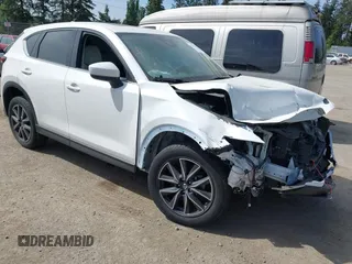 2018 Mazda CX-5 Grand Touring with VIN JM3KFBDM1J0309260, listed as a IAAI auction lot 42247237 with Not Provided miles and . Bid and sale history available at DreamBid. Image 1.