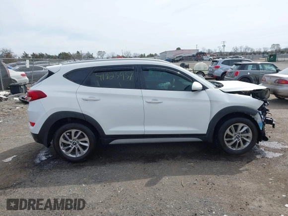 2017 Hyundai Tucson SE with VIN KM8J3CA44HU437644, listed as a IAAI auction lot 41825957 with 59,402 mi miles. Bid and sale history available at carsss.com. Image 14.