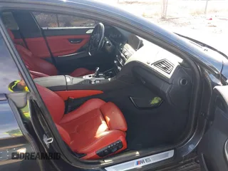 2017 BMW M6 z VIN WBS6E9C58HG437411, wystawiony jako IAAI lot #41636164 z przebiegiem 52 724 mil mil oraz . Historia ofert i sprzedaży dostępna na DreamBid. Obrazek 5.
