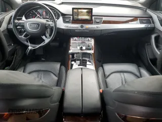 2015 Audi A8 z VIN WAUJGAFD9FN003570, wystawiony jako Copart lot #87642905 z przebiegiem 71 523 mil mil oraz Czysty tytuł • Clean title. Historia ofert i sprzedaży dostępna na DreamBid. Obrazek 8.