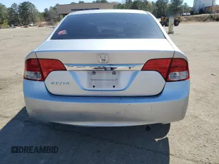 2010 Honda Civic LX with VIN 2HGFA1F51AH306669, listed as a Copart auction lot 50450825 with 143,659 mi miles and Salvage Title. Bid and sale history available at DreamBid. Image 6.