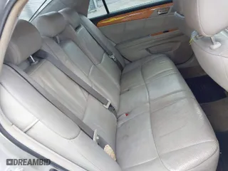 2005 Toyota Avalon XL with VIN 4T1BK36B25U061021, listed as a IAAI auction lot 41726203 with 227,845 mi miles. Bid and sale history available at carsss.com. Image 8.