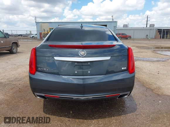 2013 Cadillac XTS Platinum z VIN 2G61V5S32D9102537, wystawiony jako IAAI lot #42230895 z przebiegiem 120 810 mil mil oraz . Historia ofert i sprzedaży dostępna na DreamBid. Obrazek 16.