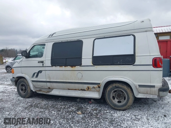1999 Dodge Cargo Conversion with VIN 2B6HB11Y8XK563608, listed as a IAAI auction lot 41726411 with 199,239 mi miles and . Bid and sale history available at DreamBid. Image 14.
