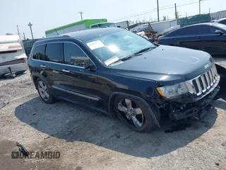 2011 Jeep Grand Cherokee Overland with VIN 1J4RR6GT3BC574037, listed as a IAAI auction lot 42411532 with 158,765 mi miles and . Bid and sale history available at DreamBid. Image 1.