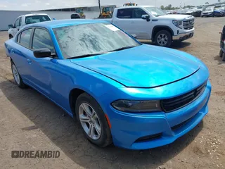 2023 Dodge Charger SXT with VIN 2C3CDXBG1PH575612, listed as a IAAI auction lot 42218345 with 50,512 mi miles and . Bid and sale history available at DreamBid. Image 1.