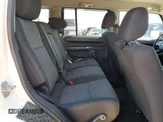 2010 Jeep Commander Sport with VIN 1J4RG4GKXAC121954, listed as a Copart auction lot 51965925 with 144,115 mi miles and Salvage title. Bid and sale history available at DreamBid. Image 11.