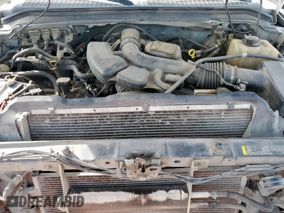 2008 Ford F-250 XL z VIN 1FTNX20508ED32012, wystawiony jako Copart lot #60426005 z przebiegiem 379 231 mil mil oraz Szkoda całkowita • Salvage title. Historia ofert i sprzedaży dostępna na DreamBid. Obrazek 11.
