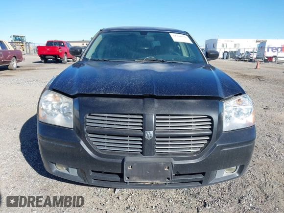 2007 Dodge Magnum R/T z VIN 2D4GV57247H737215, wystawiony jako IAAI lot #41388776 z przebiegiem 116 326 mil mil oraz . Historia ofert i sprzedaży dostępna na DreamBid. Obrazek 6.