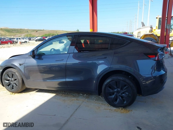 2025 Tesla Model Y Long Range with VIN 7SAYGDEE3SA367750, listed as a IAAI auction lot 41933682 with 1,127 mi miles. Bid and sale history available at carsss.com. Image 14.