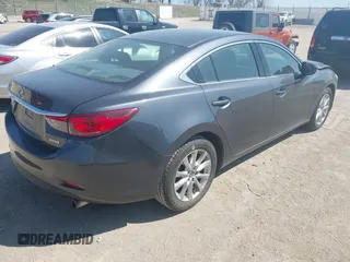2016 Mazda 6 i Sport with VIN JM1GJ1U56G1473526, listed as a IAAI auction lot 41977842 with 85,542 mi miles and . Bid and sale history available at DreamBid. Image 4.
