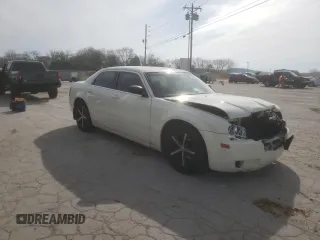 2005 Chrysler 300 with VIN 2C3JA43R25H663094, listed as a Copart auction lot 60813664 with 218,830 mi miles and Salvage Title. Bid and sale history available at carsss.com. Image 4.