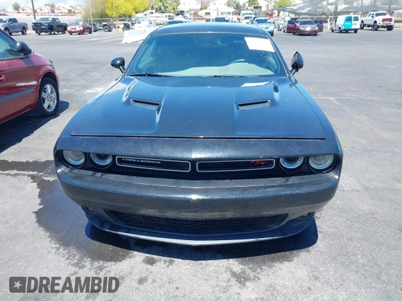 2015 Dodge Challenger R/T with VIN 2C3CDZAT3FH707200, listed as a IAAI auction lot 42154182 with 93,868 mi miles and . Bid and sale history available at DreamBid. Image 6.
