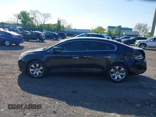 2012 Buick LaCrosse Premium 1 z VIN 1G4GD5E35CF282278, wystawiony jako IAAI lot #42146380 z przebiegiem 92 968 mil mil oraz . Historia ofert i sprzedaży dostępna na DreamBid. Obrazek 14.