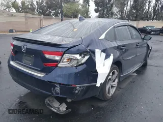2018 Honda Accord EX z VIN 1HGCV1F47JA069523, wystawiony jako IAAI lot #42188564 z przebiegiem 94 703 mil mil oraz . Historia ofert i sprzedaży dostępna na DreamBid. Obrazek 4.