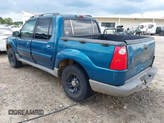 2001 Ford Explorer Sport Trac with VIN 1FMZU67E51UC75790, listed as a IAAI auction lot 42610302 with 424,045 mi miles and . Bid and sale history available at DreamBid. Image 3.