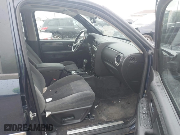 2007 GMC Envoy SLE with VIN 1GKDT13S372158038, listed as a IAAI auction lot 42103078 with 119,954 mi miles. Bid and sale history available at carsss.com. Image 5.