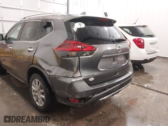 2018 Nissan Rogue S with VIN KNMAT2MT3JP544206, listed as a IAAI auction lot 41744900 with 121,839 mi miles and . Bid and sale history available at carsss.com. Image 6.